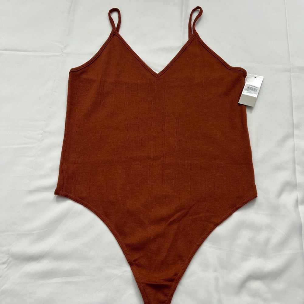 Bodysuit non adjustable straps 
NWT